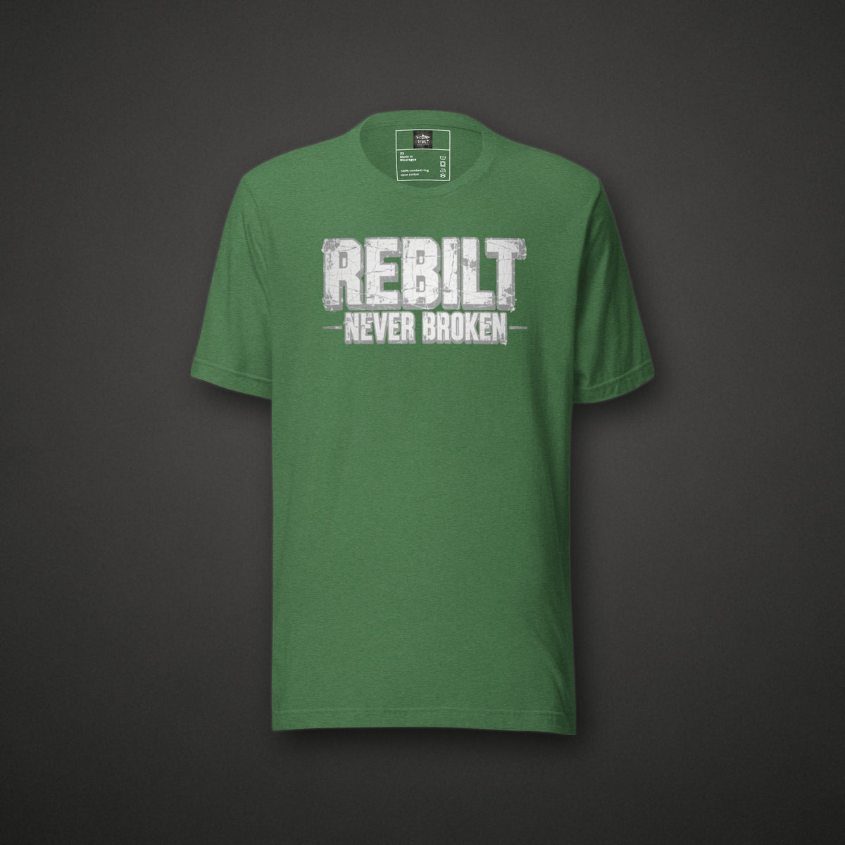 REBILT Ratty Green Tee on dark background