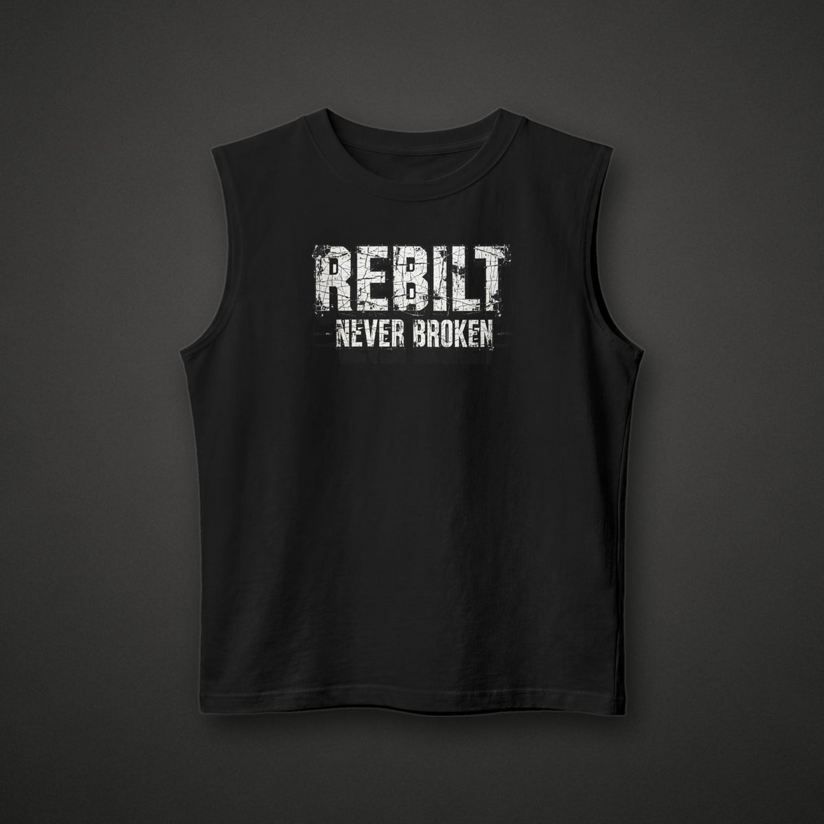 REBILT Never Broken Muscle Tank on dark background