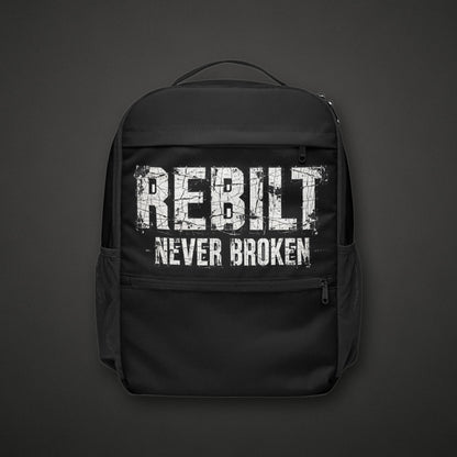 REBILT Never Broken Utility Backpack on dark background