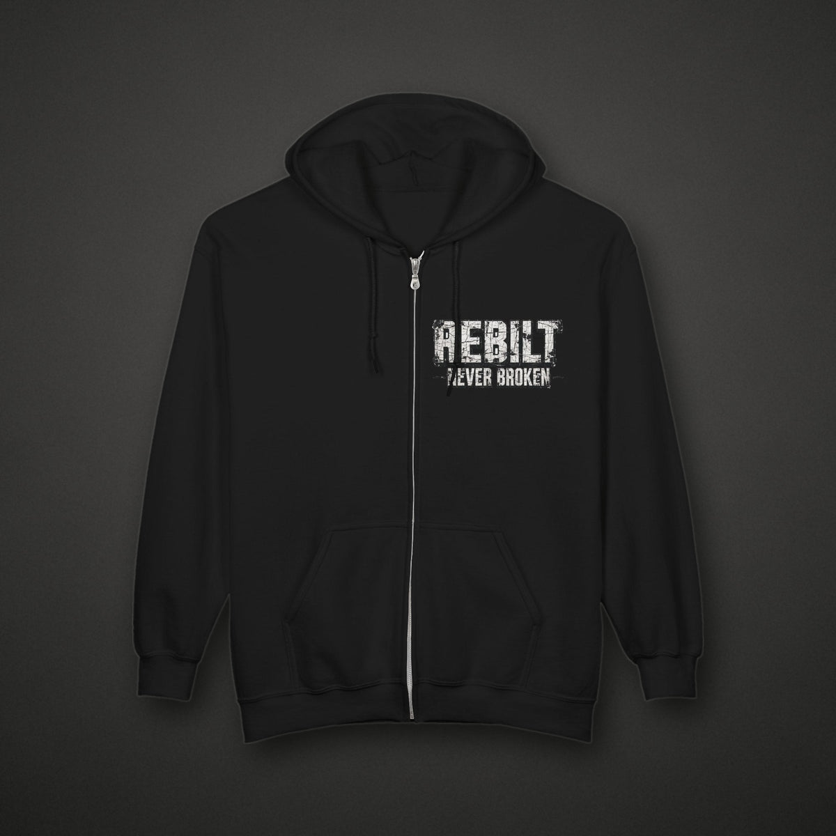REBILT Never Broken Zip Hoodie on dark background